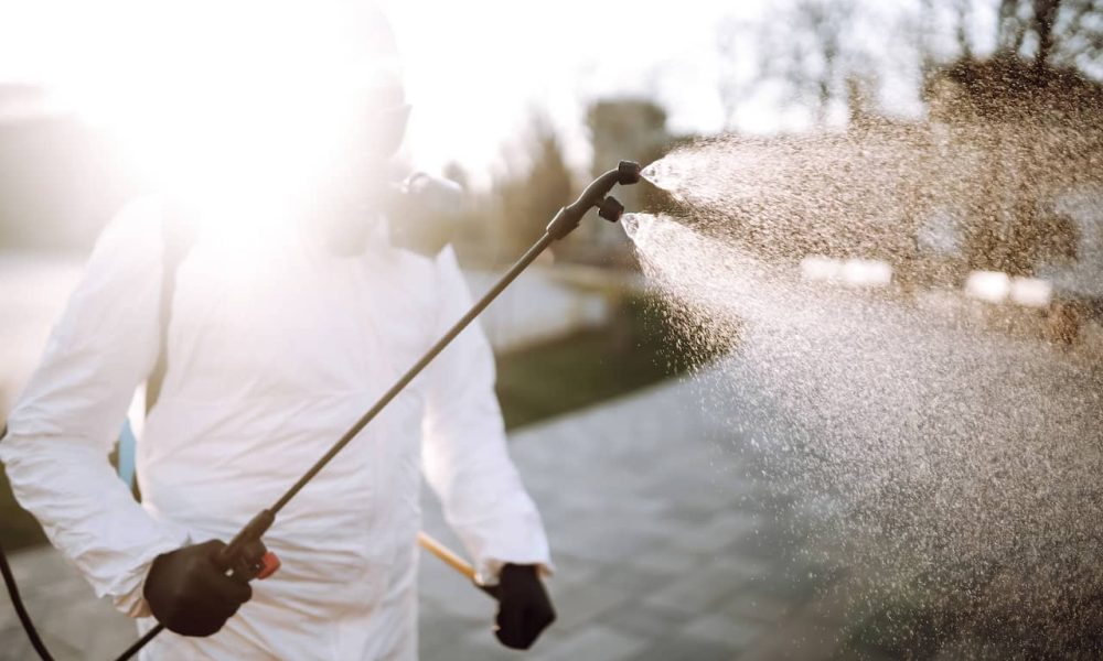 man-in-virus-protective-suit-and-mask-disinfects-p-2023-11-27-05-06-32-utc-2