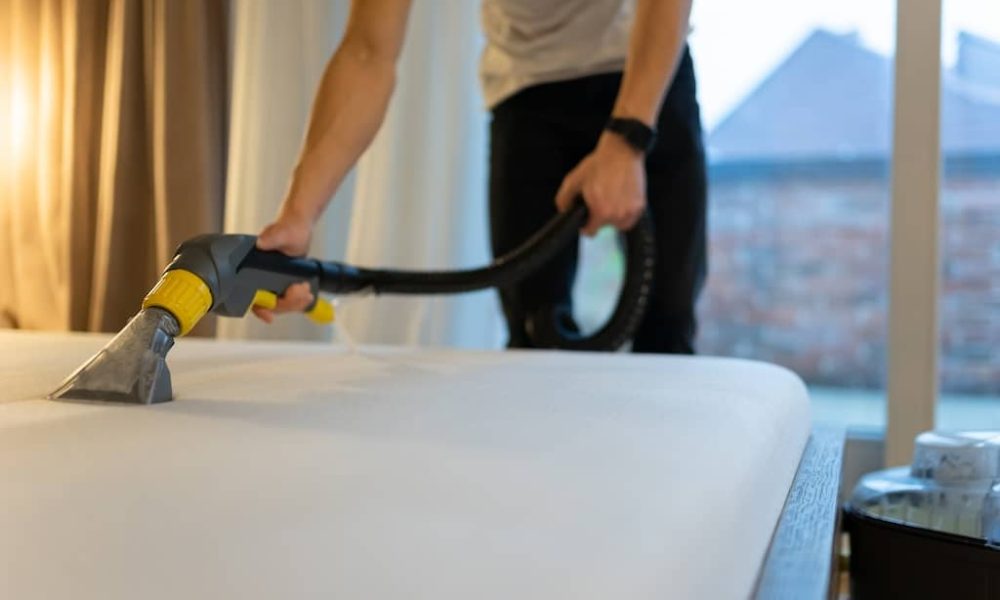 mattress-cleaning-process-man-cleans-bed-from-dir-2023-11-27-05-00-40-utc-2