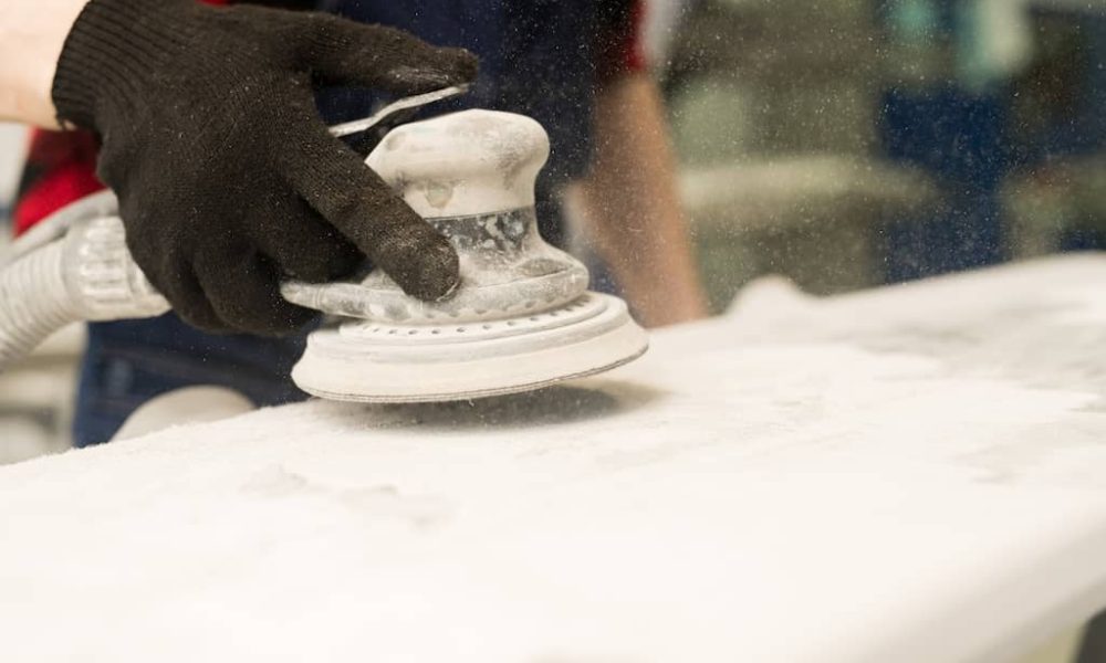 mechanic-polishing-car-2023-11-27-05-17-12-utc-2